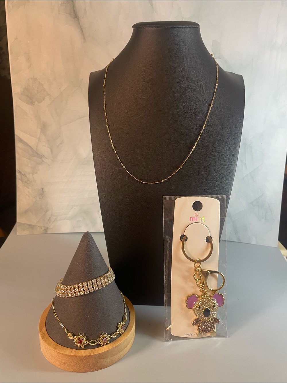 4 piece set of sparkly jewelry with keychain or bag charm